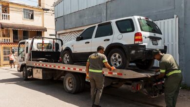 Alcaldía del DN y Digesett retiran chatarras y vehículos mal estacionados en Ensanche Quisqueya